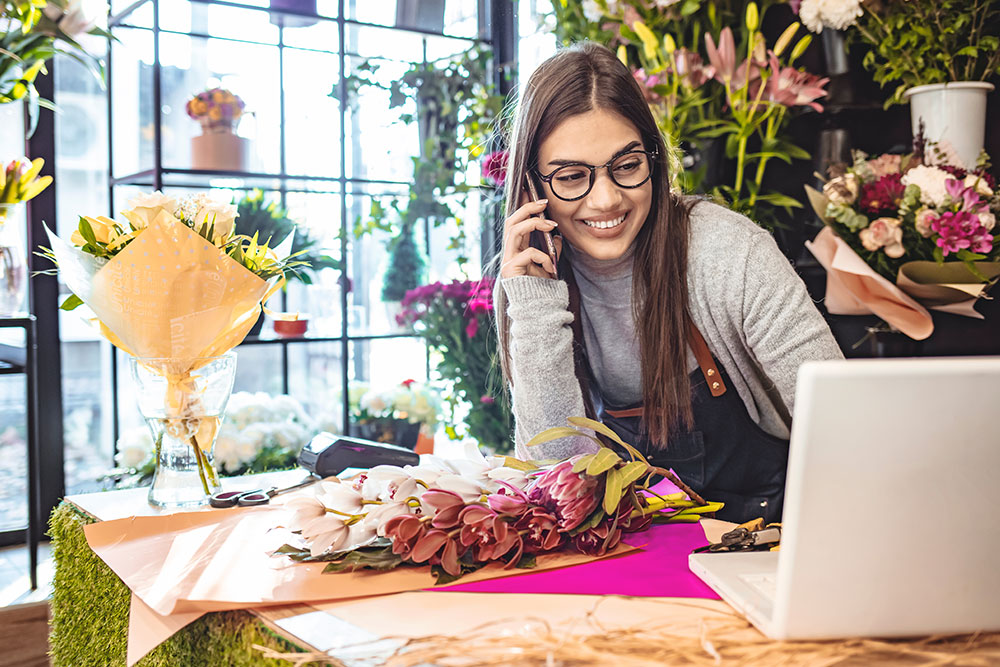 Symbio-Energy-Partners-Florist-on-Phone